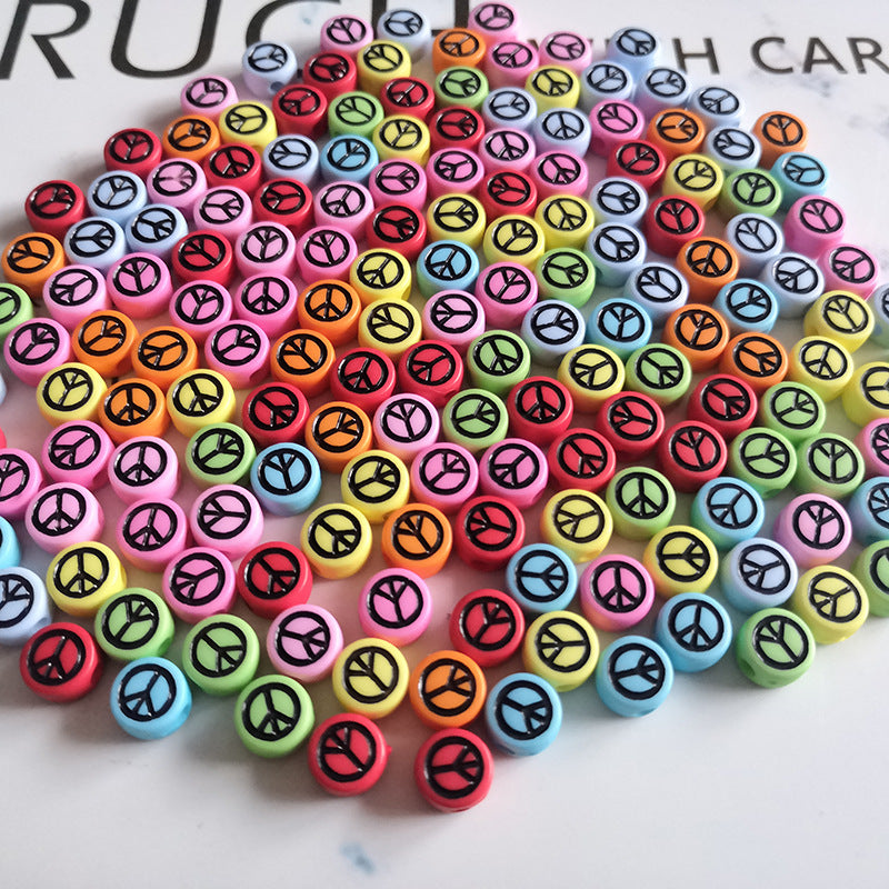 100pcs/paquete al por mayor 4*7 mm acrílico colorido de signo de paz cuentas